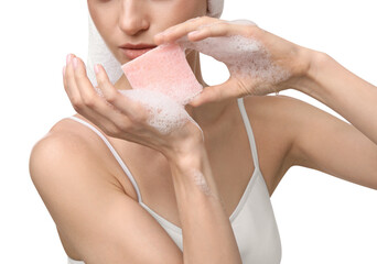 Woman with soap bar on white background, closeup