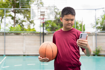 Teenage Boy on Basketball Court in Sportswear