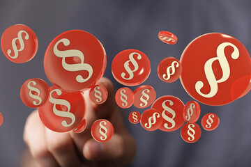 Abstract image of red paragraph symbols hovering. Ideal for legal, law, and justice concepts.
