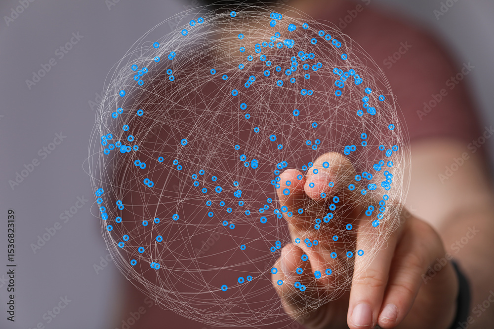 Poster Abstract image of a hand interacting with a digital network sphere. Represents global connectivity, technology, and data.