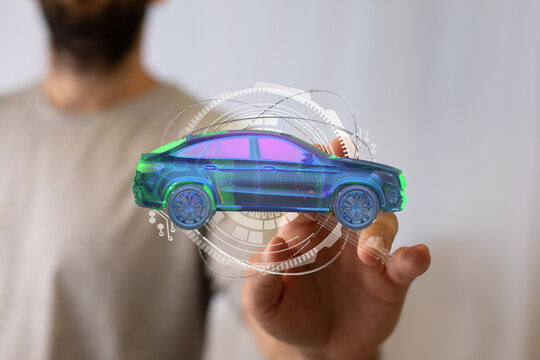 Person interacting with a digital car model hologram.  Futuristic technology concept.