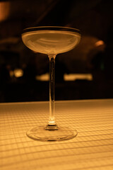 martini cocktail glass on bottom up illuminated counter