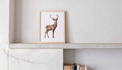 Framed deer artwork displayed on a modern shelf in a minimalist room  
