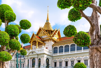 Amazing Royal grand palace in sunny day in Bangkok, Thailand. Chakri Maha Prasat Throne Hall at the Grand Palace in Bangkok.