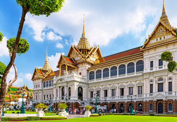 Amazing Royal grand palace in sunny day in Bangkok, Thailand. Chakri Maha Prasat Throne Hall at the Grand Palace in Bangkok.