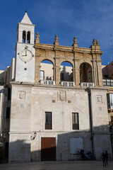Fototapeta premium People walking on the alley of Bari on Italy