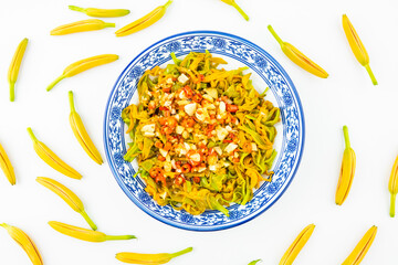A dish of salad daylily on a white background