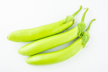 Fresh green eggplant on white background
