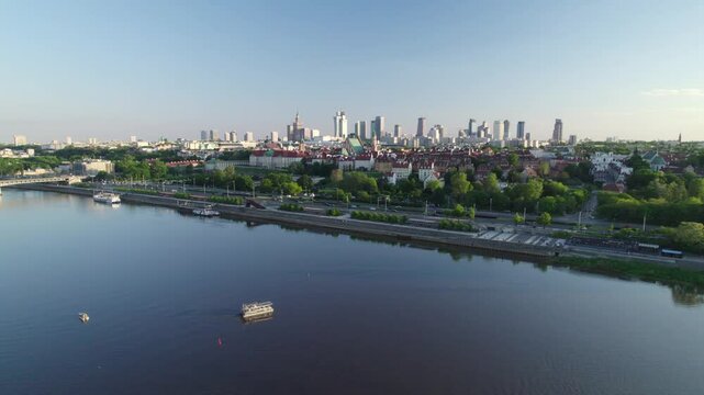 raga shore faces Old Town across the dusky Vistula waters