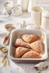 Healthy and hot triangular rolls baked in a bakehouse.