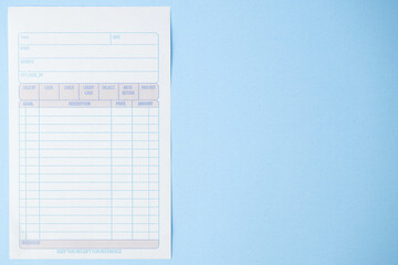 Blank sales receipt invoice page on a blue background.