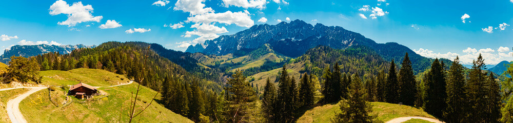 High resolution stitched alpine spring panorama with Mount Wilder Kaiser in the background at Kaiserlift Kufstein, Tyrol, Austria