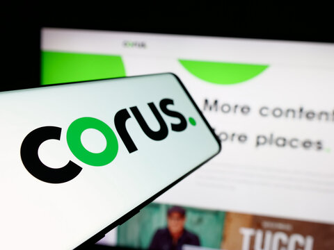 Stuttgart, Germany - 06-09-2025: Smartphone with logo of media company Corus Entertainment Inc. on screen in front of website. Focus on left of phone display.