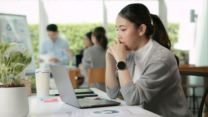 Asia people young adult woman bad day work hard bored data tired at office desk workplace think...