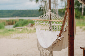 Luxury Glamping Experience with Hammock and Tent on a Wooden Deck