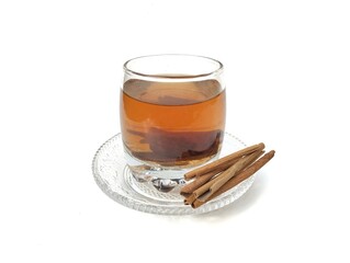 Cinnamon boiled water in glass on white background. Healthy drink lifestyle
