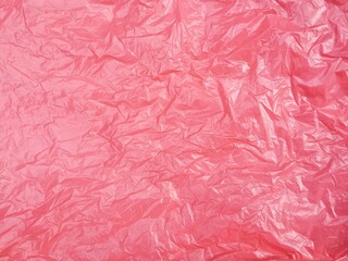 Abstrak crumpled red plastic bag texture background 