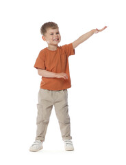 Happy little boy dancing on white background