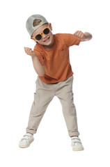 Happy little boy with sunglasses dancing on white background