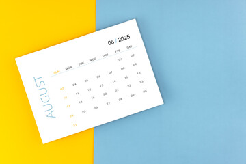 August 2025 calendar page on blue background, Position with copy space.