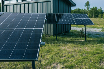 Close-up view of solar panels installed on a metal frame, showcasing the details of photovoltaic...