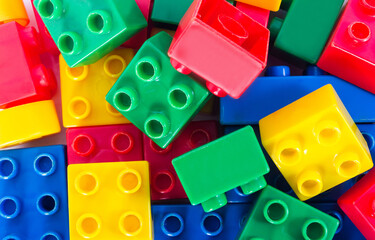 Fototapeta premium Close up photo of colorful construction block toy parts.