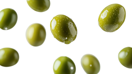 Olives glisten under bright light, suspended in mid-air, celebrating their rich color and texture in an artistic display of culinary elegance.