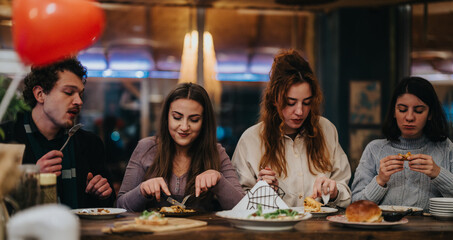 Friends gather at a stylish restaurant bar, sharing a meal and enjoying lively discussions in a warm and inviting atmosphere.