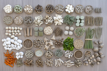 Various Traditional Chinese Herbal Medicine Ingredients Displayed as Background Concept