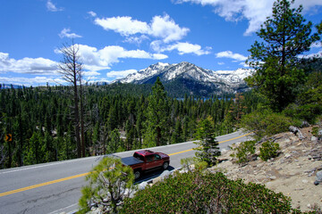 Driving Route 89 along the mountainous western coast of Lake Tahoe.