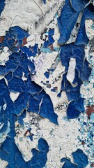 Texture of old paint on the wall. Cracks and peeling, photo for background