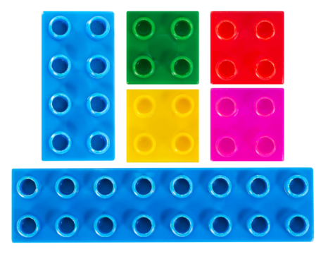 Isolated photo of construction block toy parts on white background.