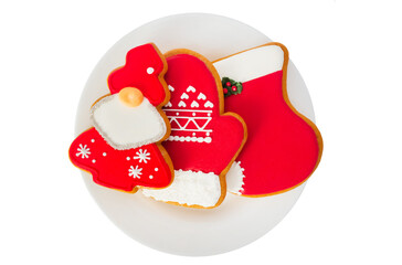 Isolated photo of christmas or new year gingerbread cookies on plate on white background.