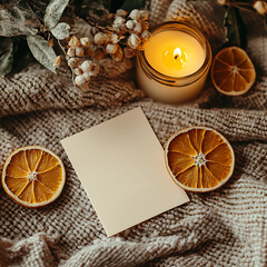 Cozy Card Mockup with Candle, Dried Orange, and Soft Blanket