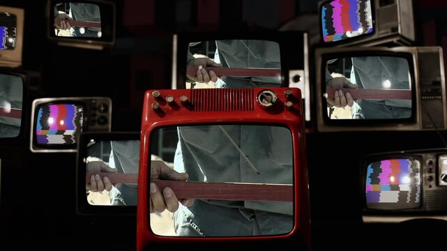 Construction Worker Welding Metal Displayed on Stacked Retro Televisions, 4K Resolution