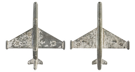 Isolated photo of antique soviet metal m 50 plane toy on white background.