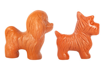 Isolated photo of soviet rubber dog toy figurines on white background.