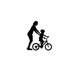 Fototapeta premium woman teaching child to ride bicycle silhouette on white background