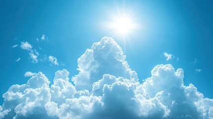 Bright sun shining through fluffy white cumulus clouds in a vivid blue sky. (1)