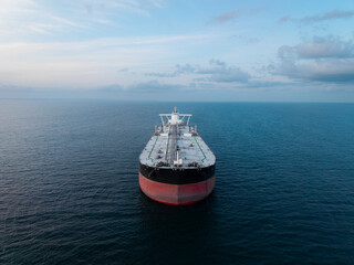 Naklejka na ściany i meble Aerial view of the front of a large crude oil tanker ship at sea
