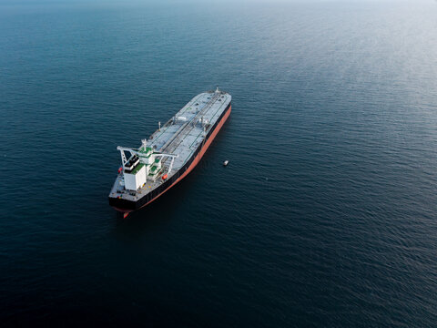 Aerial view of the front of a large crude oil tanker ship at sea