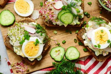 Danish Open-Faced Sandwich with herring on slices of rye bread.top veiw