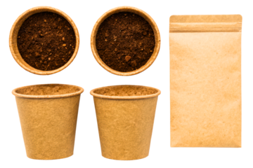 Biodegradable plant pots with soil and a seed packet isolated with transparent background