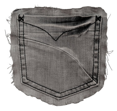 Piece of torn denim on a white background. Denim texture. Pocket