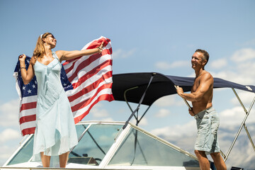 Couple With US National Flag Spending Day On Private Yac
