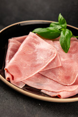 Ham slices meat spam pork fresh delicious gourmet food background on the table rustic food top view copy space