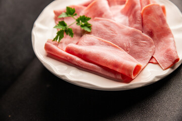 Ham slices meat spam pork fresh delicious gourmet food background on the table rustic food top view copy space