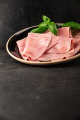 Ham slices meat spam pork fresh delicious gourmet food background on the table rustic food top view copy space