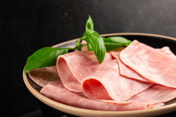 Ham slices meat spam pork fresh delicious gourmet food background on the table rustic food top view copy space