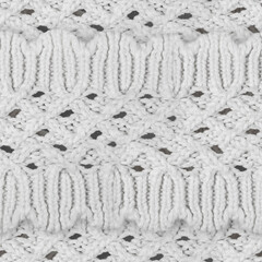 Seamless 4k photo texture of white colored woven ornate wool cloth material.